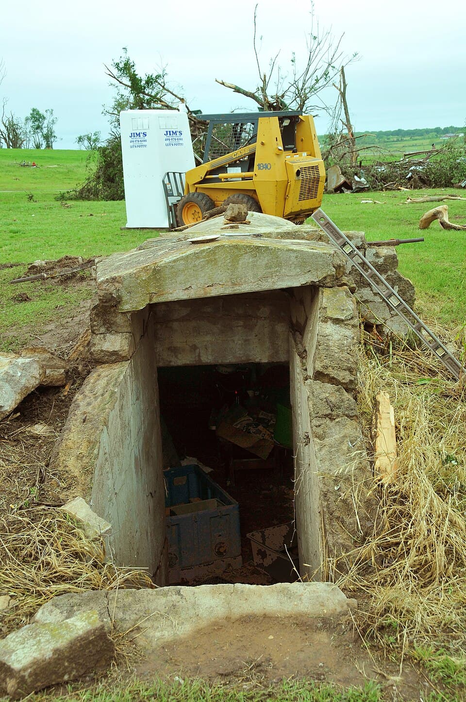 Tornado shelter doorway showing the safest place during a tornado watch vs warning escalation